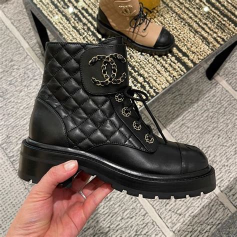 chanel coco noir boots.